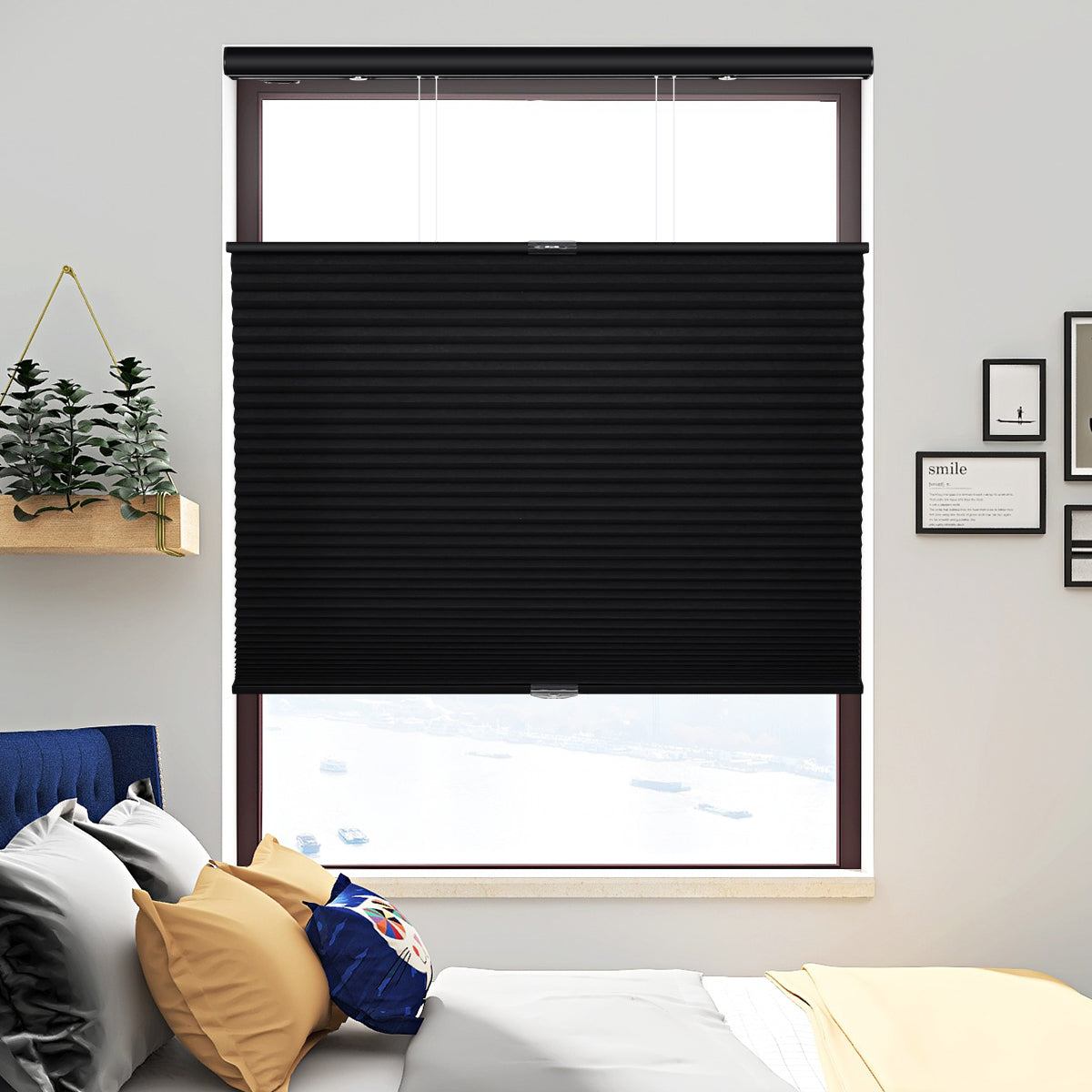 Black blackout honeycomb shades in bedroom for privacy and light control