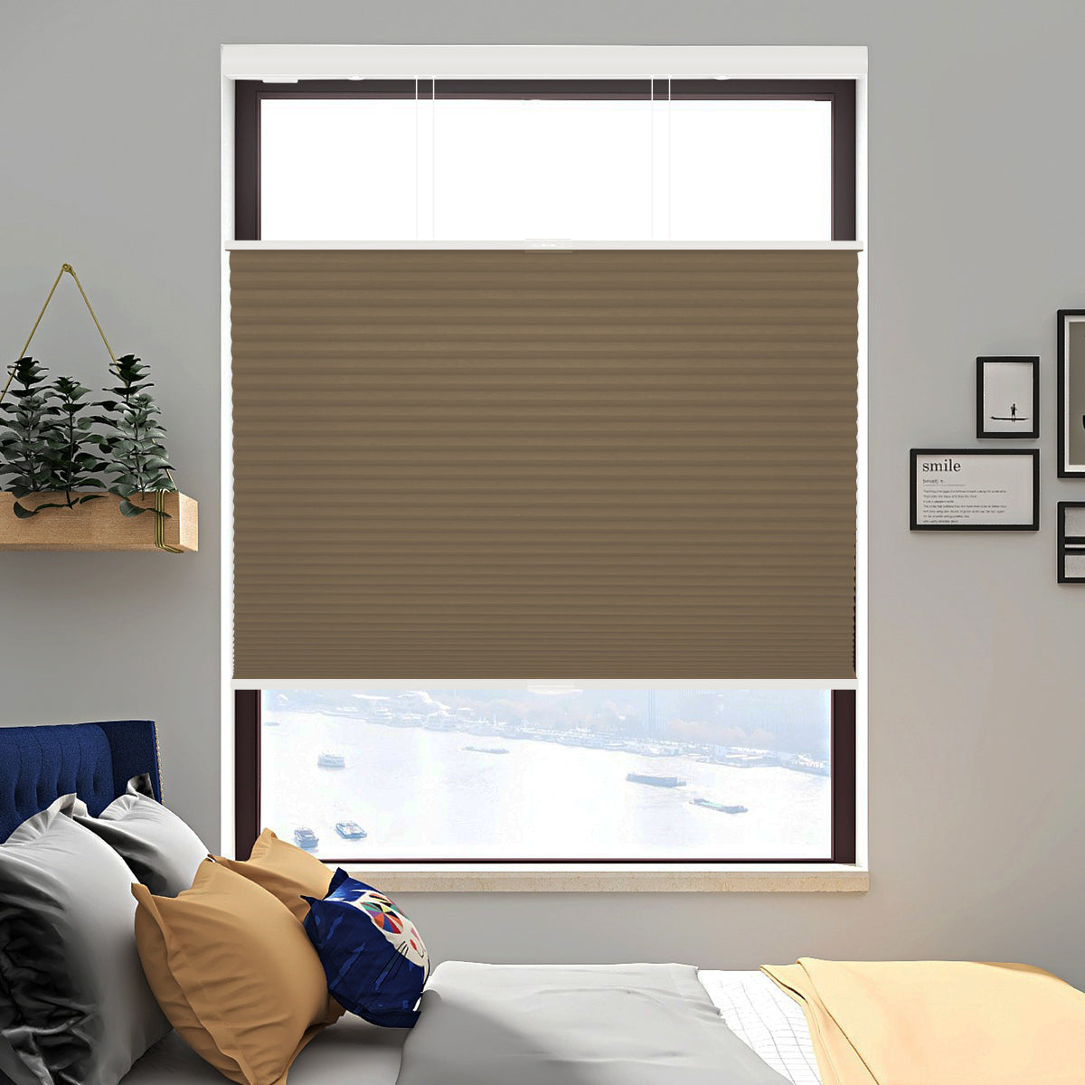 Brown blackout honeycomb shades in bedroom with modern interior