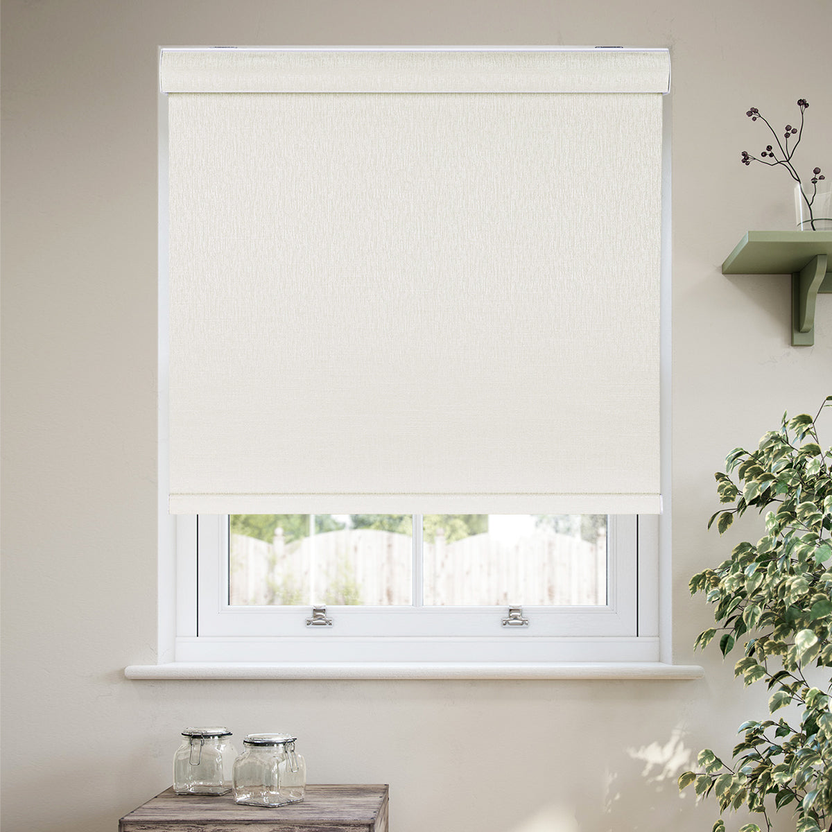 Custom cordless cassette blackout roller shades installed in a modern living room, featuring 100% blackout fabric, a sleek aluminum cassette, and child-safe cordless operation.