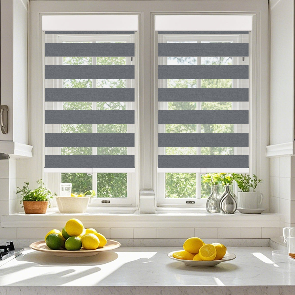 Custom cordless cassette light filtering zebra blinds in a modern kitchen, dual layer shades providing adjustable light control, soft daylight, and privacy.