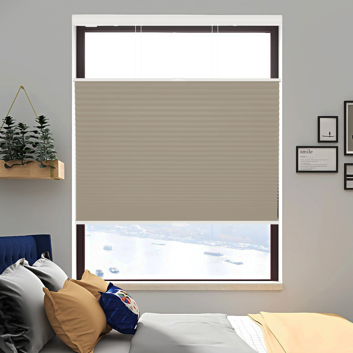 Light brown blackout honeycomb shades in bedroom for cozy privacy